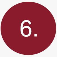 A red circle with the number 6 in it. 