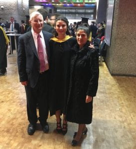 Francisca Posada-Brown at graduation with her parents