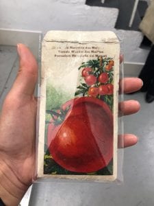 Packet of tomato seeds which contains communist propaganda and tomato seeds inside