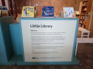 Little Library children's space with books and seating
