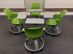Node chairs configured for groupwork in fours/two pairs around a makeshift table