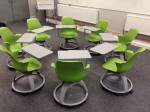 Node chairs laid out for a 'roundtable' discussion activity