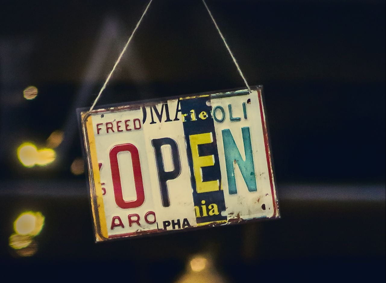 Shop sign saying OPEN