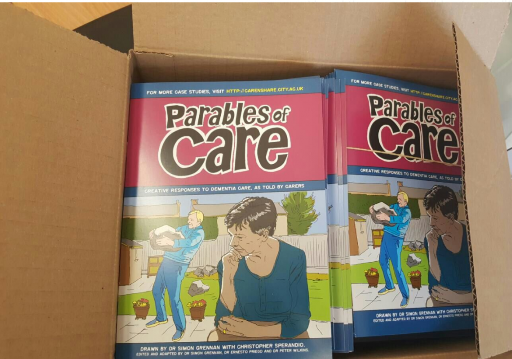 Opening a box of brand new Parables of Care copies