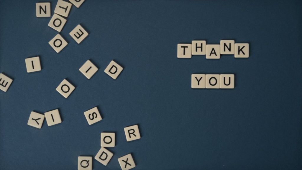 tiles spelling out thank you